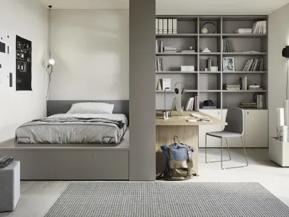 Cameretta componibile con letto su cassettone, scrivania e ampia libreria Next space 02 di Nidi